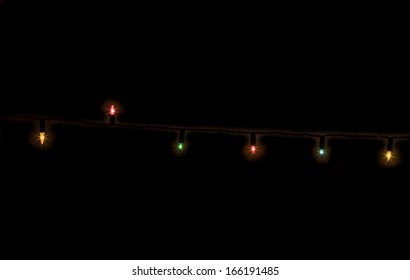 Christmas Lights Lit  At Night Isolated On Black, Vintage Lights