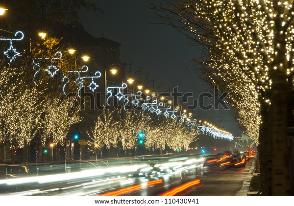 Christmas\
lights on a row of trees, Budapest,\
Hungary