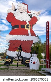 Christmas, Michigan - October 19, 2021: Large Santa Claus Outside Of The North Pole Santa's Workshop Store