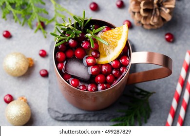 Christmas Moscow Mule, Holiday Drink In A Copper Mug. Grey Stone Background. Top View.