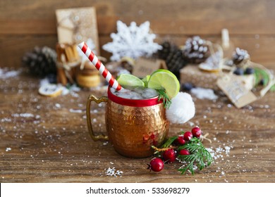 Christmas Moscow Mule, Holiday Drink In A Copper Mug On A Blue Background.