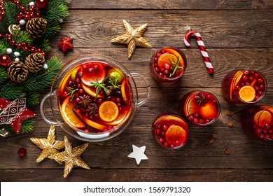 Christmas Mulled Wine Punch. Festive Red Hot Toddy Cocktail, Drink With Cranberries And Citrus Fruits