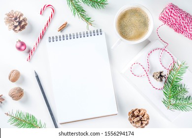 Christmas And New Year Background With Empty Notepad, Pen And Christmas Decorations. To Do List, Wishlist Concept. Mock Up, Frame, Flatlay