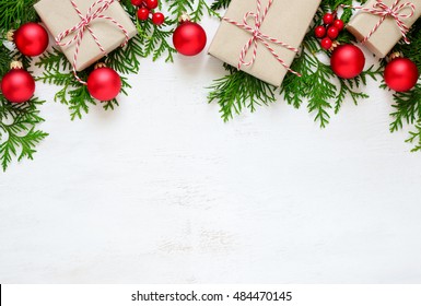 Christmas or New Year background, plain composition made of Xmas decorations and fir branches, flat lay, blank space for a greeting text - Powered by Shutterstock