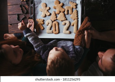 Christmas And New Year Celebration. Family Time. Holidays. Little Boy And Parents With Gingerbread Cookies.