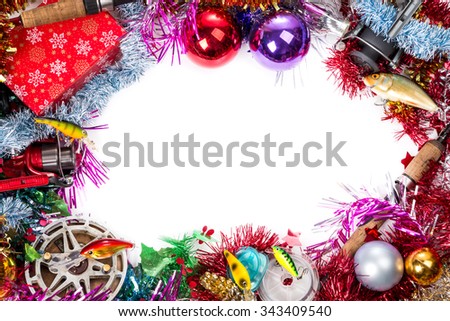 christmas and new year frame for postcard for fishers and anglers. fishing tacklesl on bright spangles and ball background