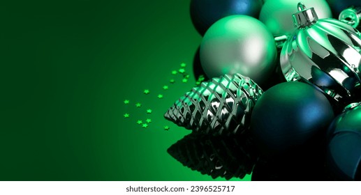 Christmas and New Year green color baubles decoration background.  Art design backdrop with holiday ball. Beautiful Christmas balls closeup. Copy space - Shutterstock ID 2396525717