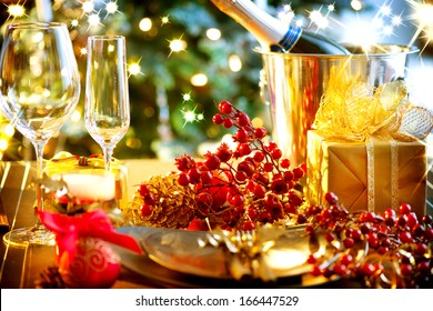 Christmas And New Year Holiday Table Setting With Champagne. Celebration. Place Setting For Christmas Dinner. Holiday Decorations. Decor. Served Table