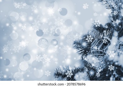 Christmas and New Year holidays background. Blurred background, snowflakes and bokeh.