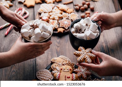 Christmas And New Year Holidays, Family Weekend Activities, Celebration Mood. Friends Eating Festive Sweets With Hot Chocolate. Winter Warming Concept And Friendly Atmosphere