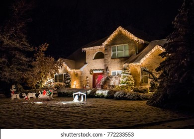 Christmas And New Year Outdoor Decorations Of House At Night