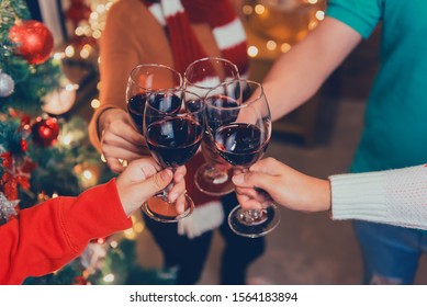 Christmas And New Year Party With Asian Friends. Winter And End Of Year Celebrating With Drinking Red Wine.