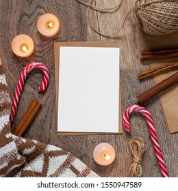 Christmas And New Year Template For Greeting Card With Candy Canes, Cinnamon Sticks And Candles. Square Mockup With Vertical Blank Sheet Of Paper