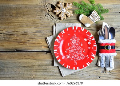 Christmas and New Year's service with a plate and decorations, copy space