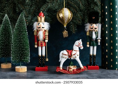 Christmas Nutcracker toy soldier and horse on Christmas background with fir tree branches - Powered by Shutterstock