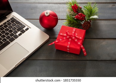 Christmas, Office Closed. Business Desk, Computer Laptop And Xmas Decoration On Blue Wooden Background, Copy Space.