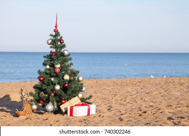 Christmas on the beach with gifts new year - Powered by Shutterstock