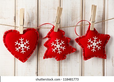 Christmas ornament hanging on wooden background - Powered by Shutterstock