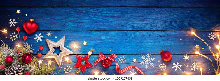 Christmas Ornament On Blue Table With String Light
