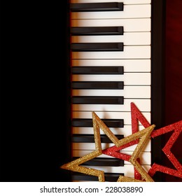 Christmas Ornaments On Piano Keys