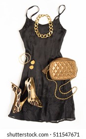 Christmas Party Outfit. Cocktail Dress Outfit, Night Out Look On White Background. Little Black Dress, Gold Bag, Leopard Shoes, Gold Necklace. Flat Lay, Top View