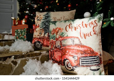 Christmas Pillows In Basket On Snow, 

Pillows With Christmas Inscriptions