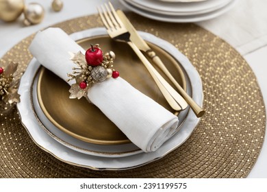 Christmas place setting table decoration, gold and red festive centerpiece arrangement on plate close up - Powered by Shutterstock