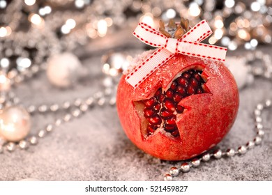 Christmas pomegranate. Selective focus - Powered by Shutterstock