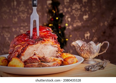 Christmas Pork Shoulder Joint With Roast Potatoes.