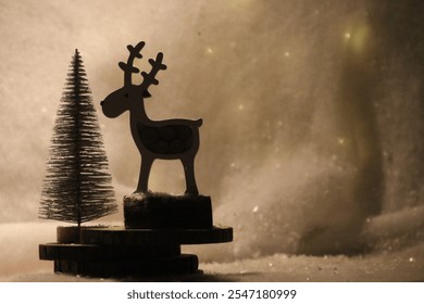 Christmas postcard with a reindeer and a tree, with snow in the background and warm light. - Powered by Shutterstock