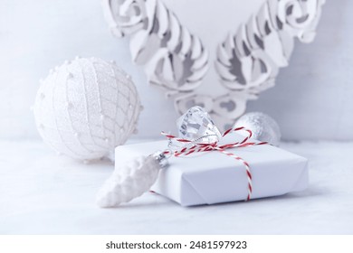 Christmas present on bright wooden background. Close up. Copy space.
 - Powered by Shutterstock