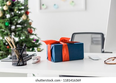 Christmas Present On On White Table In Office