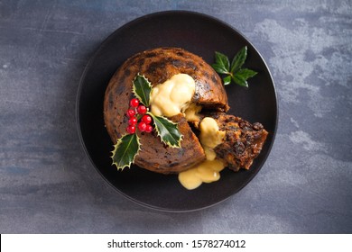 Christmas Pudding Decorated With Sprig Of Holly. Cristmas Decorations. View From Above, Top