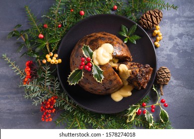 Christmas Pudding Decorated With Sprig Of Holly. Cristmas Decorations. View From Above, Top