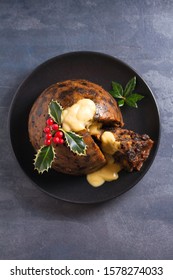 Christmas Pudding Decorated With Sprig Of Holly. Cristmas Decorations. View From Above, Top