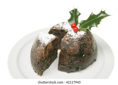 Christmas Pudding On A Plate Isolated Against White