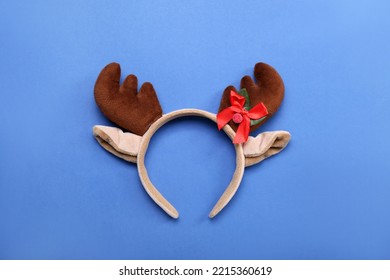 Christmas Reindeer Horns On Blue Background