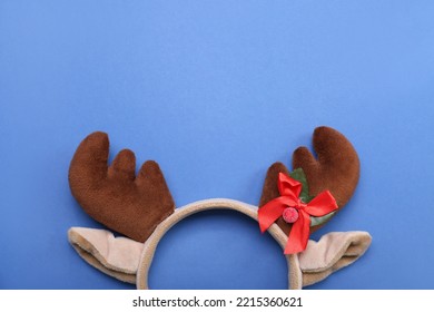 Christmas Reindeer Horns On Blue Background