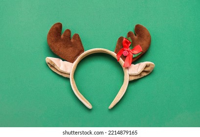 Christmas Reindeer Horns On Green Background