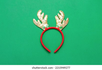 Christmas Reindeer Horns On Green Background