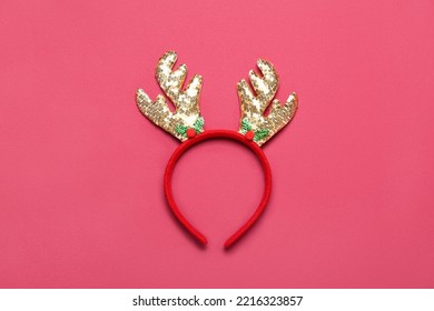 Christmas Reindeer Horns On Red Background