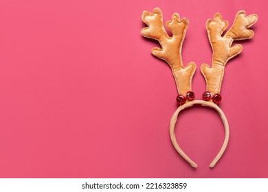 Christmas Reindeer Horns On Red Background