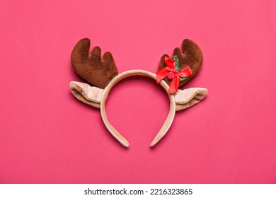 Christmas Reindeer Horns On Red Background