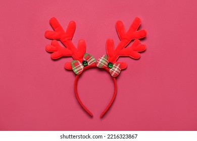 Christmas Reindeer Horns On Red Background