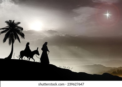 Christmas Religious Nativity Concept: Mary And Joseph With A Donkey