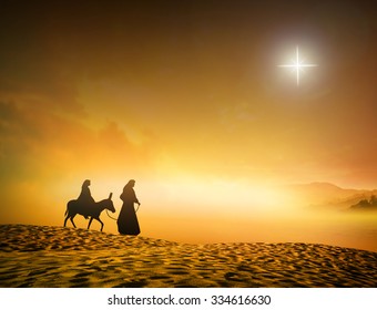 Christmas religious nativity concept: Silhouette pregnant Mary and Joseph with a donkey on Christmas eve background