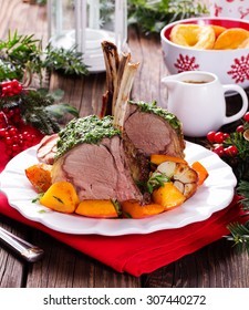 Christmas roast beef with Yorkshire pudding and roasted vegetables. Festive dinner.
