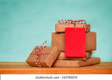 Happy Boxing Day Messages, Wishes, Quotes, And Images 43 Christmas sale concept, stack of christmas presents with red tag with empty space for a text, front view