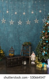 Christmas Scene With Tree, Gifts And Decorations In Background. New Year Holiday Interior Background With Stars.