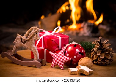 Christmas scene with tree gifts and fire in background